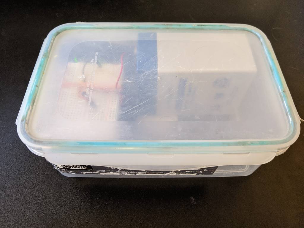 The Arduino 'stack' and battery in its waterproof container